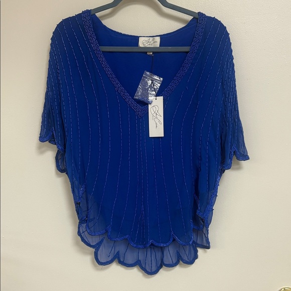 joy cioci Tops - ❄️ electric blue beaded blouse